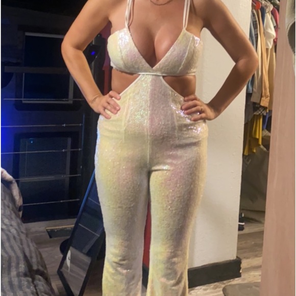 It’s white glamorous size xs paint suit. - Picture 2 of 2